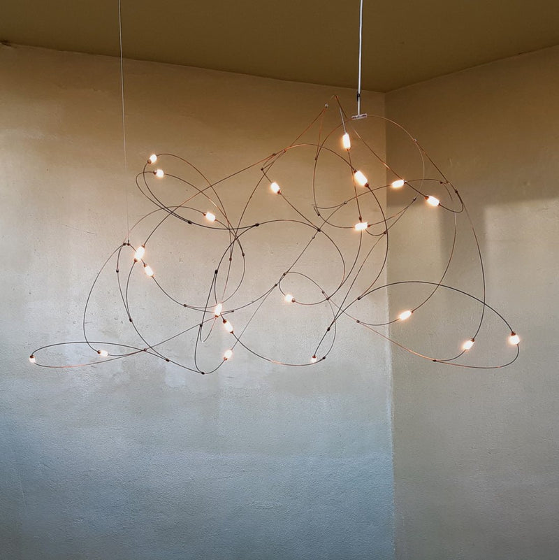 Flock of Light fra Moooi, taklampe med kobbertråder med små led lys. 