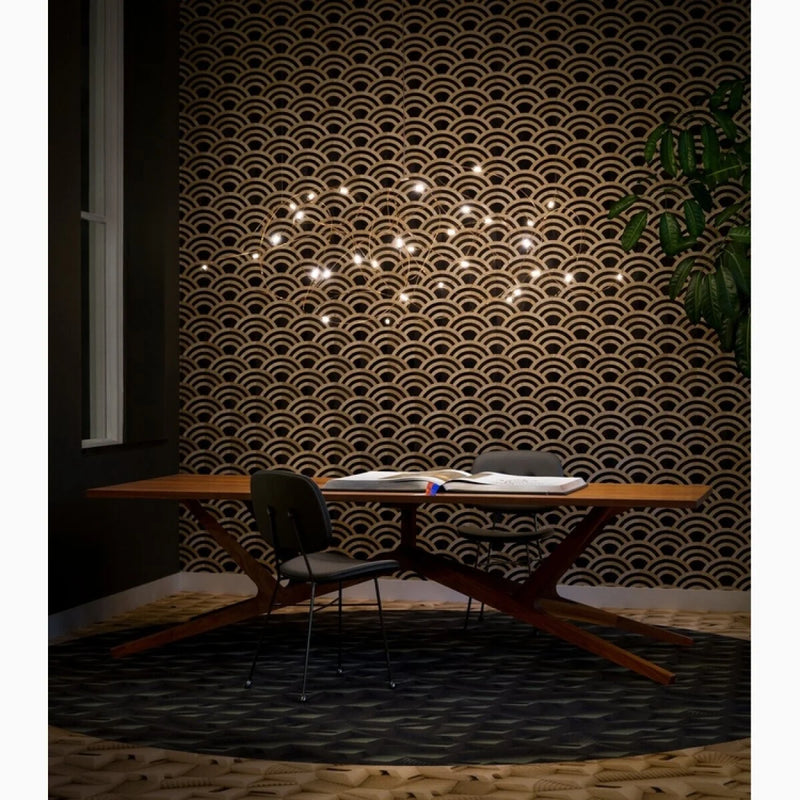 Flock of Light 31 fra Moooi, lett taklampe med tynne kobbertråder og lys som minner om ildfluer